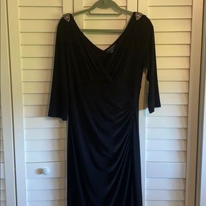 Black faux wrap dress with broach